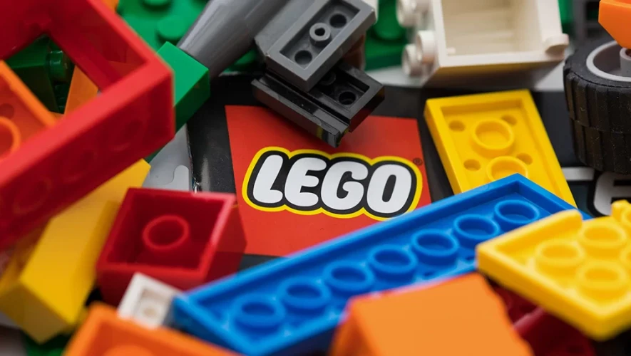 Lego logo in the middle of lego blocks