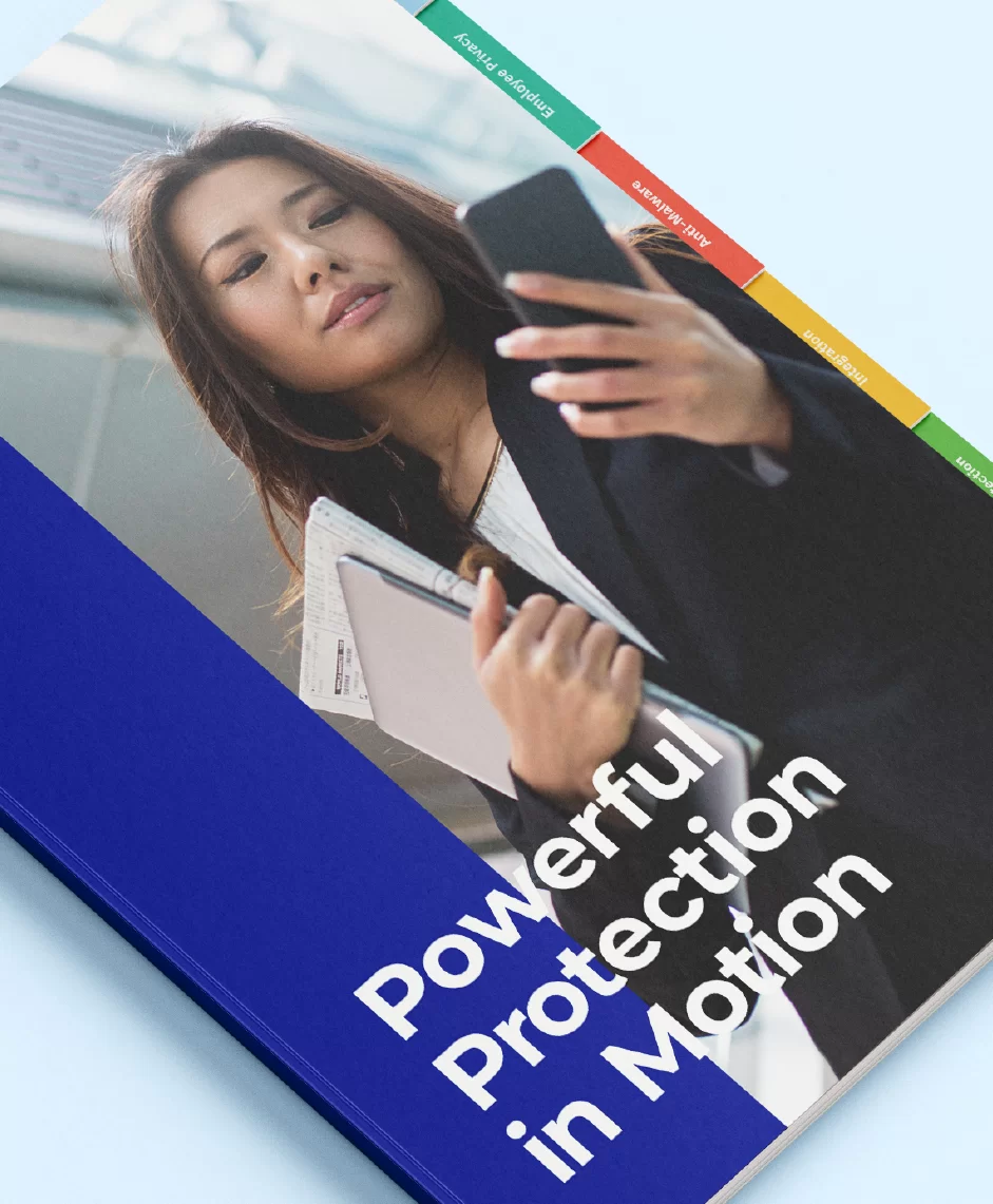 a front cover of a report portraying a young woman in formal wear holding a closed laptop close to her chest with one hand and looking at her phone screen that she's holding in the other hand