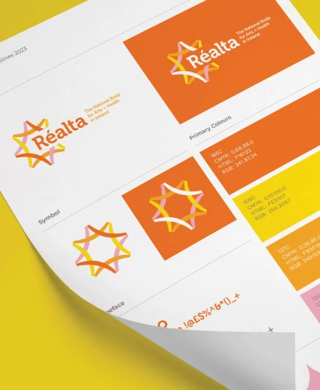 Closeup of a page with brand guidelines with a curled edge