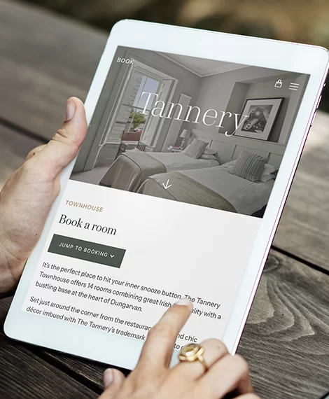 portrait tablet with a view of Tannery website page