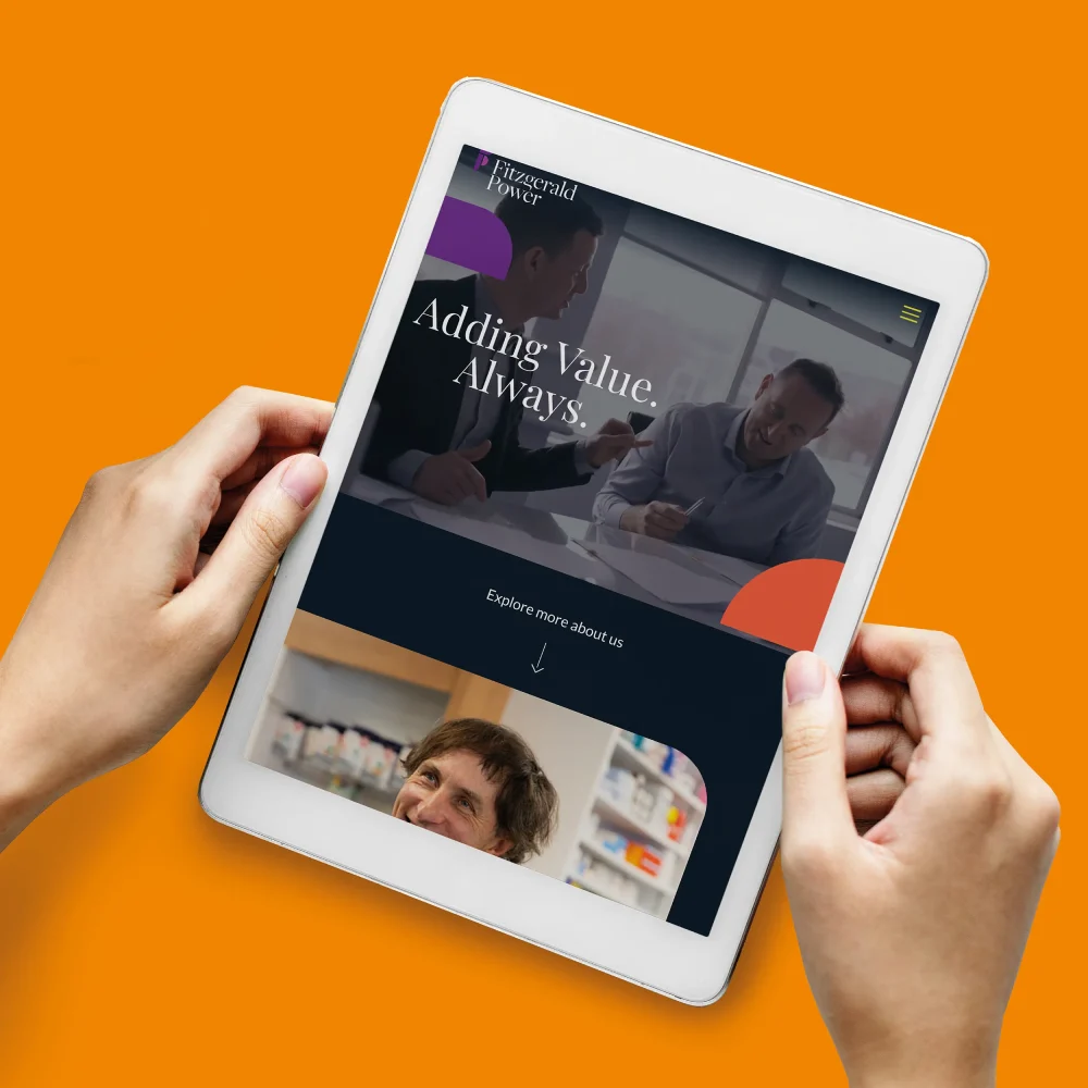 Hands holding an ipad
